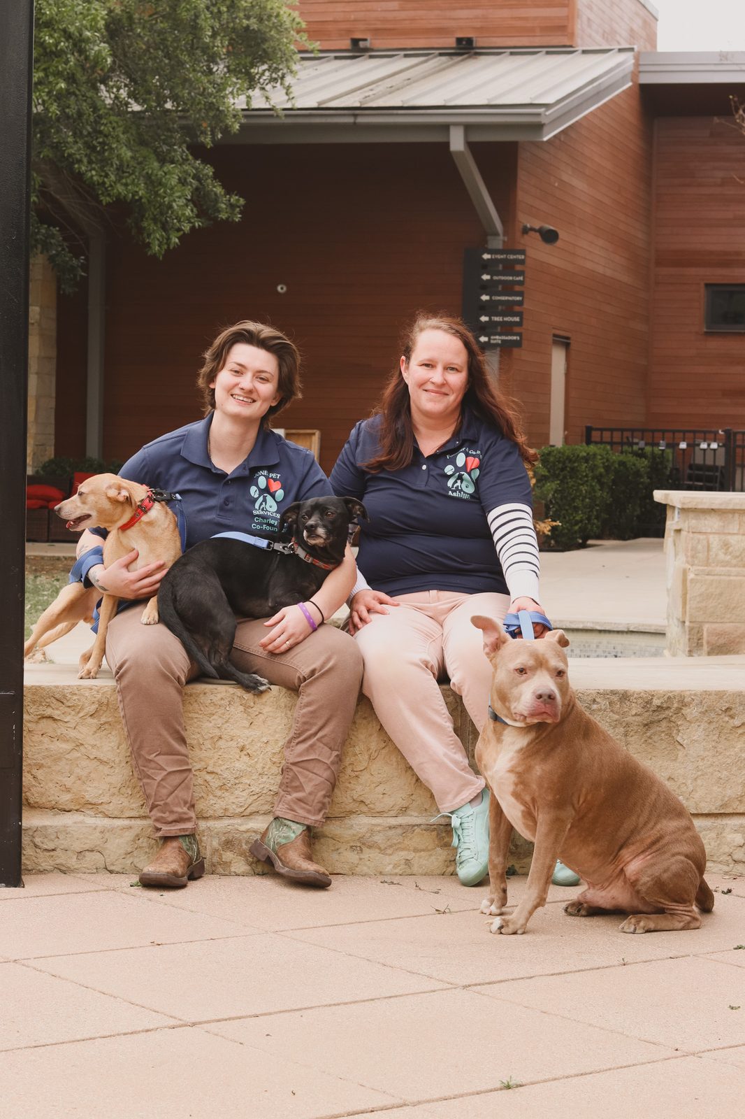Ashlyn and Charley with their dogs